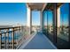 Spacious balcony with seating offers stunning city views, perfect for outdoor relaxation and entertainment at 33 S Palm Ave # 1602, Sarasota, FL 34236
