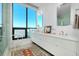 Contemporary bathroom with sleek vanity, city view window, and modern fixtures at 33 S Palm Ave # 1602, Sarasota, FL 34236