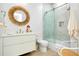 Bright bathroom featuring modern fixtures, a stylish mirror, and a glass-enclosed shower, creating a spa-like atmosphere at 33 S Palm Ave # 1602, Sarasota, FL 34236