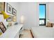 Bright bedroom with city views, a modern desk area, and stylish decor creates a comfortable and inviting space at 33 S Palm Ave # 1602, Sarasota, FL 34236