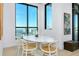 Bright dining area with floor to ceiling windows, modern decor and views of the city at 33 S Palm Ave # 1602, Sarasota, FL 34236