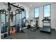 Well-equipped gym with modern exercise machines and ample natural light from large windows at 33 S Palm Ave # 1602, Sarasota, FL 34236