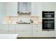 Contemporary kitchen featuring stainless steel appliances, gas range and plenty of cabinet storage at 33 S Palm Ave # 1602, Sarasota, FL 34236
