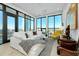 Bright living room with city views through large windows, modern furniture, and stylish decor at 33 S Palm Ave # 1602, Sarasota, FL 34236