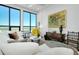 Living room offering ample seating, large windows with city views and stylish modern decor at 33 S Palm Ave # 1602, Sarasota, FL 34236