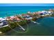 Aerial view of waterfront home with a private dock and ocean access at 3300 Casey Key Rd, Nokomis, FL 34275