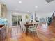 Dining room with tile floors and easy access to the backyard at 3300 Casey Key Rd, Nokomis, FL 34275