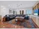 Bright living room offers water views and built-in shelving at 3300 Casey Key Rd, Nokomis, FL 34275