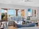 Comfortable living room with ocean views and a coastal-inspired design at 3300 Casey Key Rd, Nokomis, FL 34275
