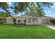 Charming single-story home with a well-manicured lawn and a quaint, inviting facade at 3301 62Nd Street W Cir, Bradenton, FL 34209