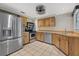 Updated kitchen with stainless steel appliances and custom cabinets at 3301 62Nd Street W Cir, Bradenton, FL 34209