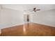 Spacious living room featuring hardwood floors, a ceiling fan, and neutral paint at 3301 62Nd Street W Cir, Bradenton, FL 34209