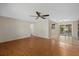 Living room featuring hardwood floors and access to the patio at 3301 62Nd Street W Cir, Bradenton, FL 34209
