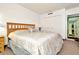 Bedroom with wood headboard and neutral decor at 36750 Us 19 N # 03102, Palm Harbor, FL 34684