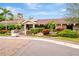 Charming clubhouse exterior boasting stone accents, lush landscaping, and a welcoming entrance at 36750 Us 19 N # 03102, Palm Harbor, FL 34684