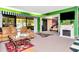 Comfortable living room with bright green walls and plenty of natural light at 36750 Us 19 N # 03102, Palm Harbor, FL 34684