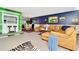 Cozy living space with blue accent wall and neutral furniture at 36750 Us 19 N # 03102, Palm Harbor, FL 34684