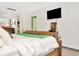 Luxurious bedroom featuring a king bed, TV, and stylish decor at 36750 Us 19 N # 03102, Palm Harbor, FL 34684