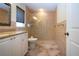 Tiled bathroom with walk-in shower and updated vanity with granite counters at 3843 El Poinier W Ct # 8720, Sarasota, FL 34232