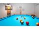Bright game room featuring a blue felt pool table and a dart board, perfect for entertaining guests at 3843 El Poinier W Ct # 8720, Sarasota, FL 34232