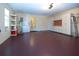 Spacious garage featuring lots of storage, ample lighting, and room for multiple vehicles at 3843 El Poinier W Ct # 8720, Sarasota, FL 34232