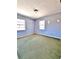 Modest bedroom featuring two windows and showing green carpet throughout at 4221 26Th W St, Bradenton, FL 34205