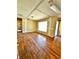 Large living room with hardwood floors and lots of natural light at 4221 26Th W St, Bradenton, FL 34205