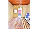 Room with tiled floor, exposed beams, and visible renovation materials at 4221 26Th W St, Bradenton, FL 34205