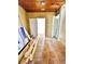 Room with tiled floor, exposed beams, and visible renovation materials at 4221 26Th W St, Bradenton, FL 34205