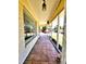 Enclosed sunroom with tiled floor, natural light, and views of the outdoors at 4221 26Th W St, Bradenton, FL 34205