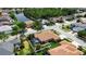 Home with a screened-in pool, and landscaped backyard, nestled in a serene neighborhood near a tranquil pond at 4706 Josselin Pl, Parrish, FL 34219