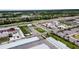 Wide aerial view of commercial services for the community, including self storage, car wash, fast food and gas station at 4706 Josselin Pl, Parrish, FL 34219