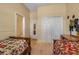 Bedroom with twin beds, carpet, access to the bathroom, and a wardrobe at 4706 Josselin Pl, Parrish, FL 34219