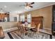 Inviting dining room featuring a round table, wooden chairs, and classic decor at 4706 Josselin Pl, Parrish, FL 34219