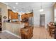 Bright kitchen featuring stainless steel appliances, ample cabinetry, and a cozy dining area with natural light at 4706 Josselin Pl, Parrish, FL 34219