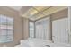 Bathroom featuring a light colored countertop, a mirror, and an inset shower at 5106 Far Oak Cir, Sarasota, FL 34238