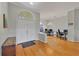 The foyer boasts wood floors and high ceilings, leading to a home office space at 5106 Far Oak Cir, Sarasota, FL 34238