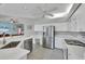 Well-equipped kitchen with stainless steel appliances and stone countertops at 5106 Far Oak Cir, Sarasota, FL 34238