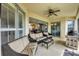 Relaxing outdoor patio, perfect for entertaining with comfortable seating and barbecue area at 5106 Far Oak Cir, Sarasota, FL 34238