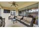 Inviting outdoor patio featuring comfortable seating and a barbecue area for entertaining at 5106 Far Oak Cir, Sarasota, FL 34238