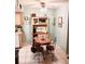 Charming eat-in kitchen featuring a round table and vintage-inspired decor at 5400 26Th W St # F104, Bradenton, FL 34207