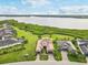 Magnificent waterfront home features meticulously maintained landscaping, and a paver driveway at 5402 Tidewater Preserve Blvd, Bradenton, FL 34208