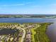 Scenic aerial view of waterfront community and bay at 5402 Tidewater Preserve Blvd, Bradenton, FL 34208