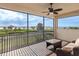 Relaxing screened balcony with scenic views of the lake and lush greenery from this inviting outdoor space at 5402 Tidewater Preserve Blvd, Bradenton, FL 34208