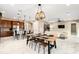 Bright dining area connects the kitchen and living room in an open concept living area at 5402 Tidewater Preserve Blvd, Bradenton, FL 34208