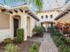 Inviting home entrance with manicured landscaping and stylish architectural details at 5402 Tidewater Preserve Blvd, Bradenton, FL 34208