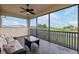 Relaxing screened patio with comfortable seating and scenic backyard views at 5402 Tidewater Preserve Blvd, Bradenton, FL 34208
