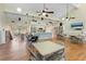 Large clubhouse with multiple ceiling fans, a kitchen, and ample seating at 5736 Ashton Lake Dr, Sarasota, FL 34231