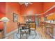 Dining area with seating for four next to kitchen bar seating at 5736 Ashton Lake Dr, Sarasota, FL 34231