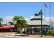 Charming Siesta Key gazebo with American flag in beautiful city square near local restaurants and shops at 5736 Ashton Lake Dr, Sarasota, FL 34231